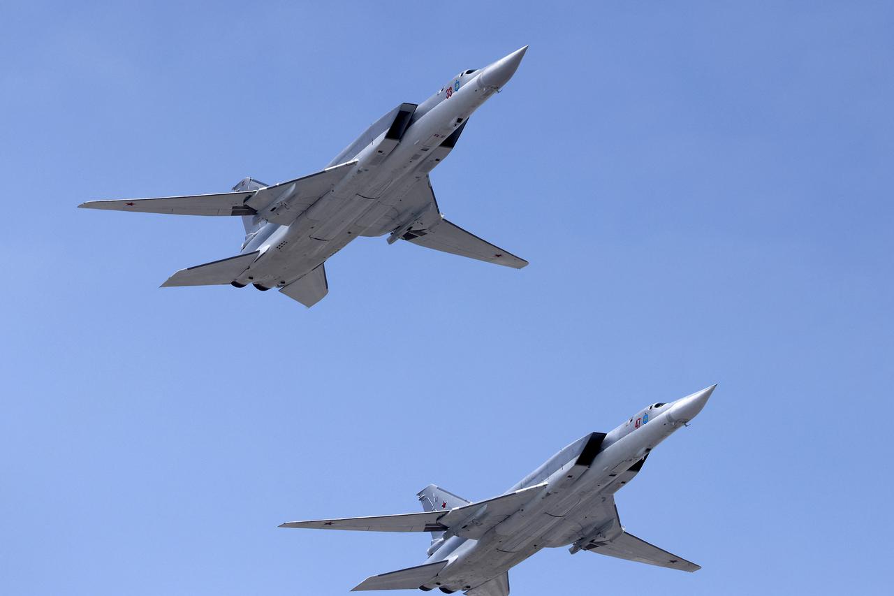 FILE PHOTO: Russian Tu-22M3 bombers fly in formation in rehearsal for Victory Day Parade in Moscow