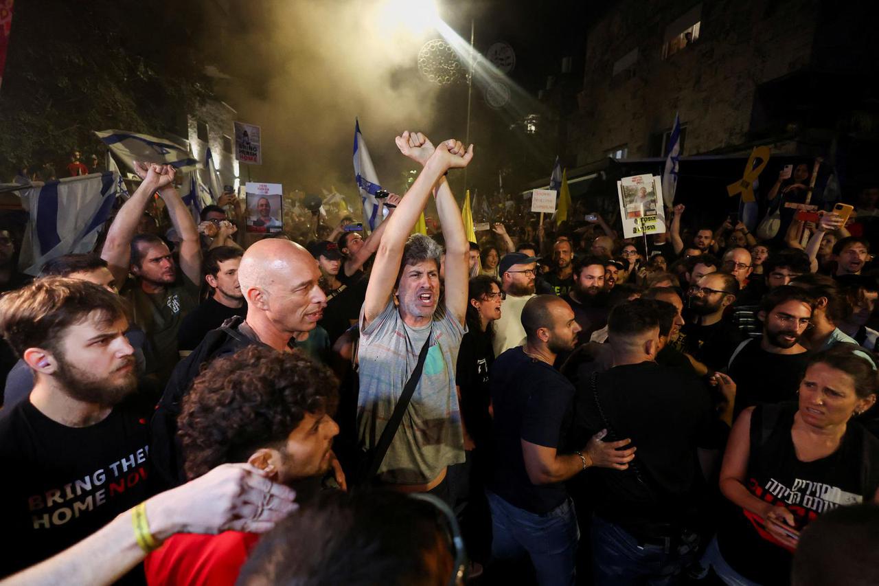 People attend a demonstration calling for the immediate return of hostages held in Gaza, in Jerusalem