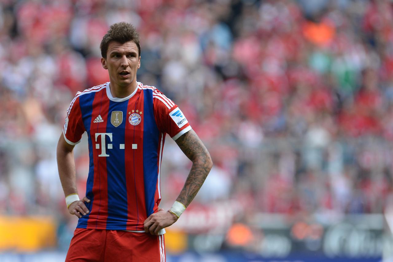 Munich's Mario Mandzukic stands on the pitch during the German Bundesliga soccer match between FC Bayern Munich and VfB Stuttgart at Allianz Arena in Munich, Germany, 10 May 2014. Photo: ANDREAS GEBERT/dpa/DPA/PIXSELL