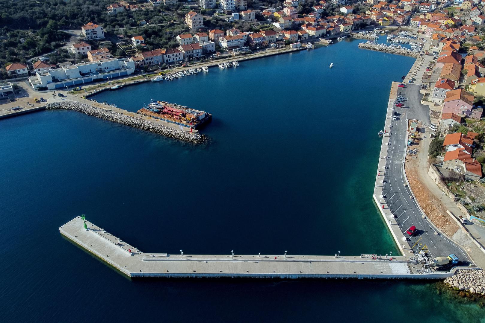 26.01.2024., Sali - Pogled iz zraka na novu luku Sali sa 116 m dugim lukobranom i 150 m nove obale Photo: Sime Zelic/PIXSELL