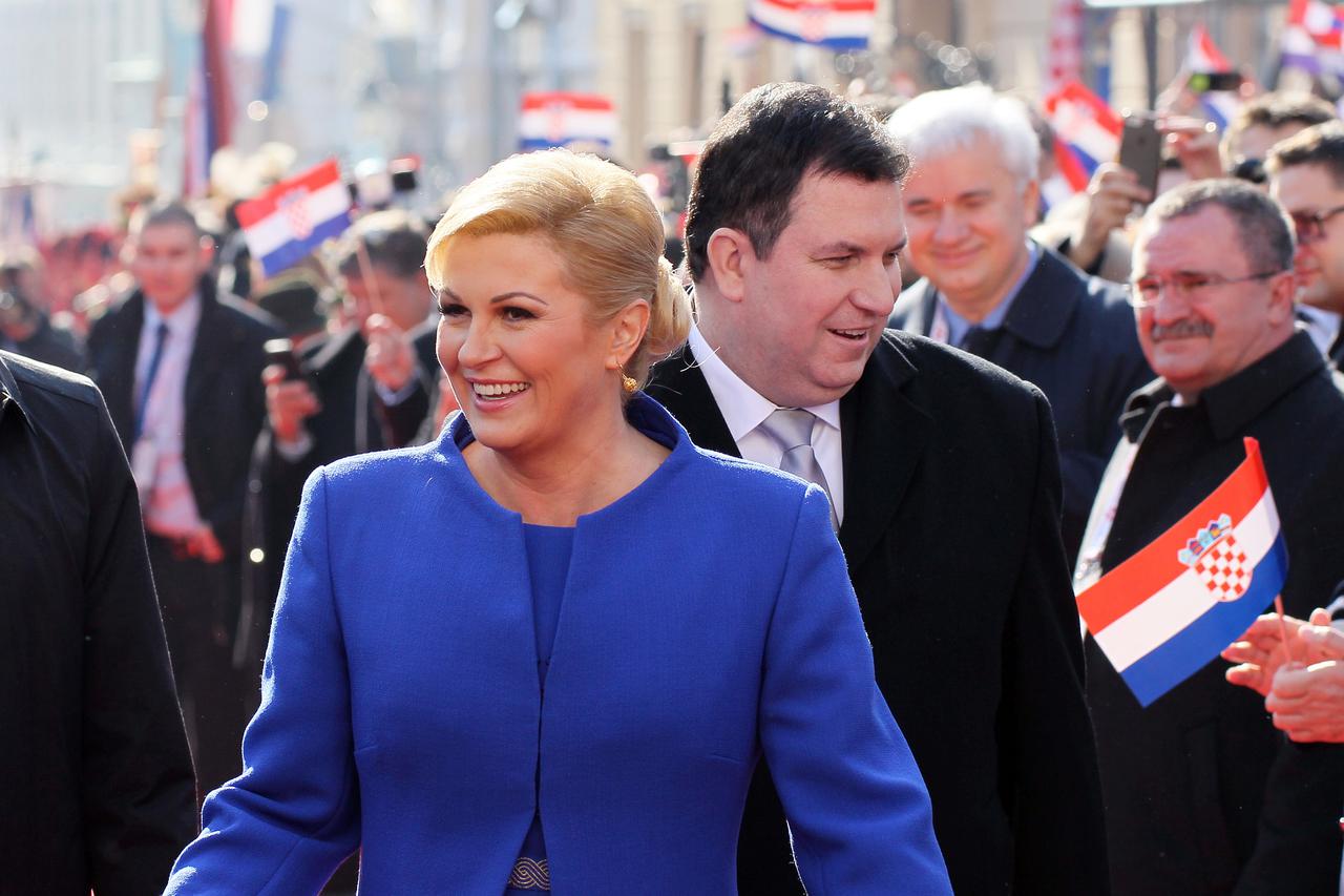 15.02.2015., Zagreb - Kolinda Grabar Kitarovic u pratnji supruga Jakova, na svecanu inauguraciju na Trg sv. Marka stigla je uspinjacom i Cirilometodskom ulicom kroz spalir gradjana te postrojenih povijesnih postrojbi iz cijele Hrvatske