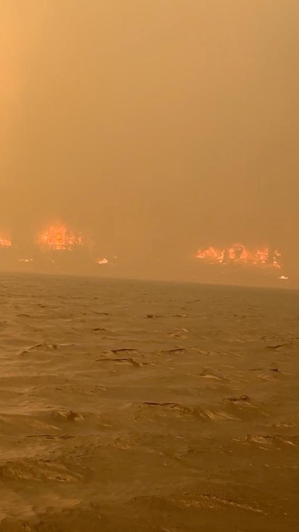 Smoke rises during the wildfire in Shuswap, British Columbia, Canada August 18, 2023, in this screen grab taken from a social media video. Diana Padula/via REUTERS THIS IMAGE HAS BEEN SUPPLIED BY A THIRD PARTY. MANDATORY CREDIT. NO RESALES. NO ARCHIVES. Photo: DIANA PADULA/REUTERS