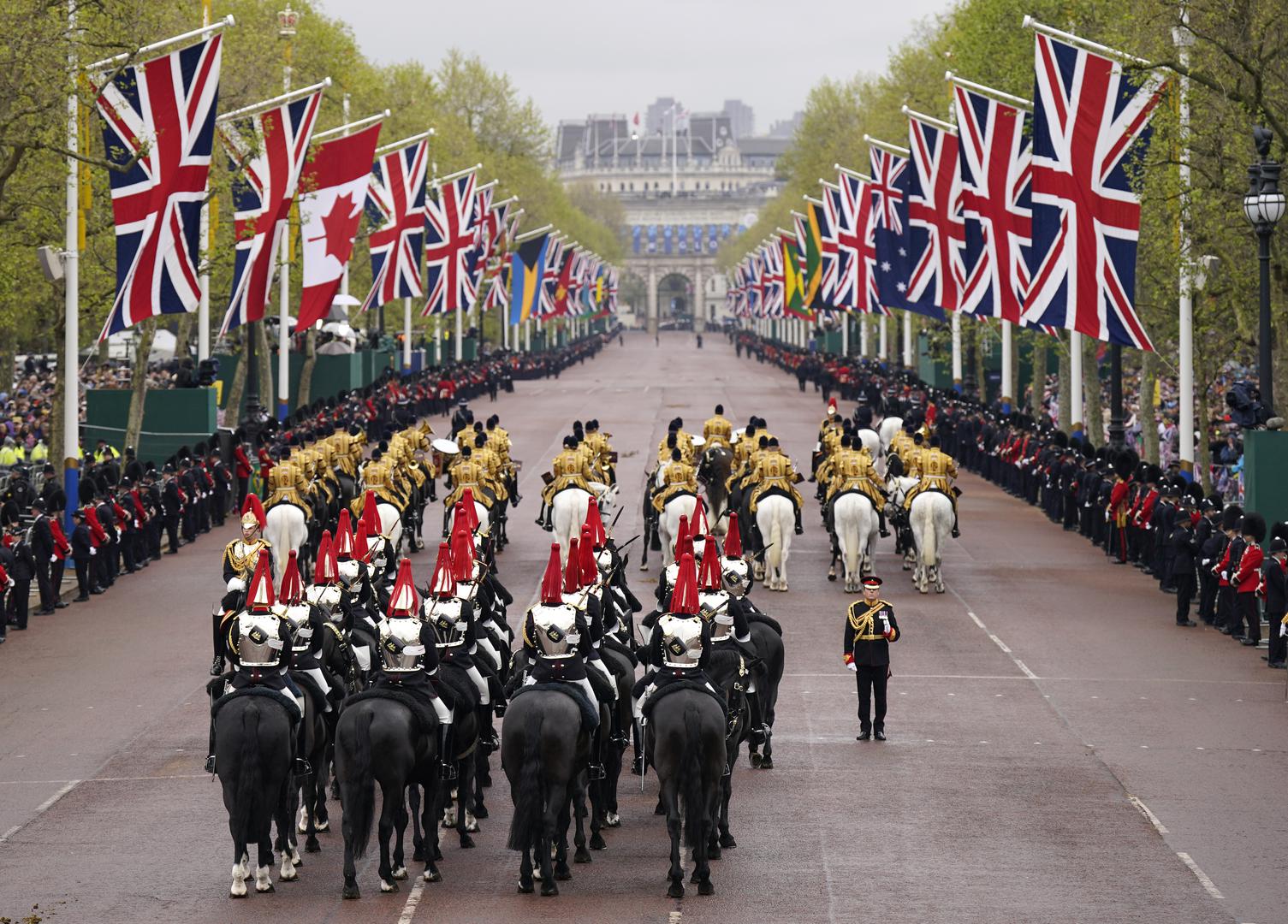 Members of the Household Cavalry mounted regiment make their way along The Mall ahead of the coronation ceremony of King Charles III and Queen Camilla in central London. Picture date: Saturday May 6, 2023. Photo: Niall Carson/PRESS ASSOCIATION