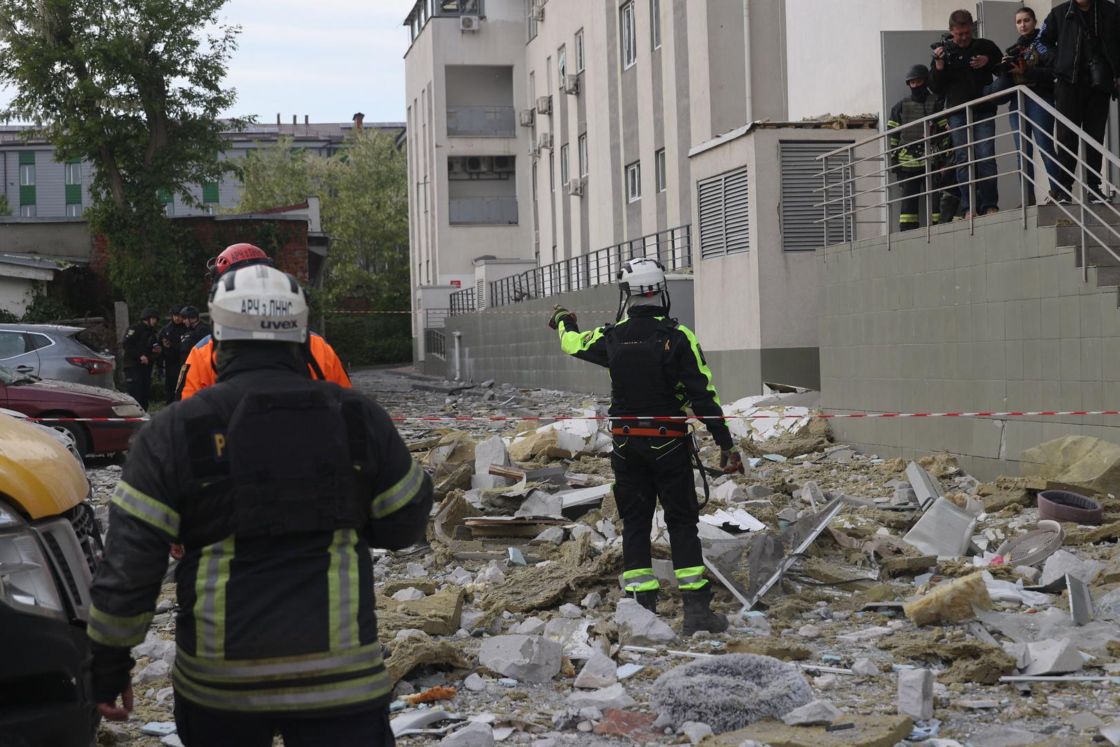 Rescuers are seen outside a multi-story residential building damaged by Russian shelling, Kharkiv, northeastern Ukraine, May 14, 2024. A Russian air strike has hit a high-rise residential building in Kharkiv, local officials said, as Russian forces continued to make deeper advances. There was no immediate mention of casualties or the extent of the damage, according to the regional governor, who warned there was a threat of more strikes coming. More than 7,000 people have fled Kharkiv since Russia launched its ground invasion on Friday as Kyiv’s top general warned that while the situation was stabilising, his troops are outgunned and outnumbered. Photo by Viacheslav Madiievskyi/Ukrinform/ABACAPRESS.COM Photo: Madiyevskyy Vyacheslav/Ukrinform/ABACA