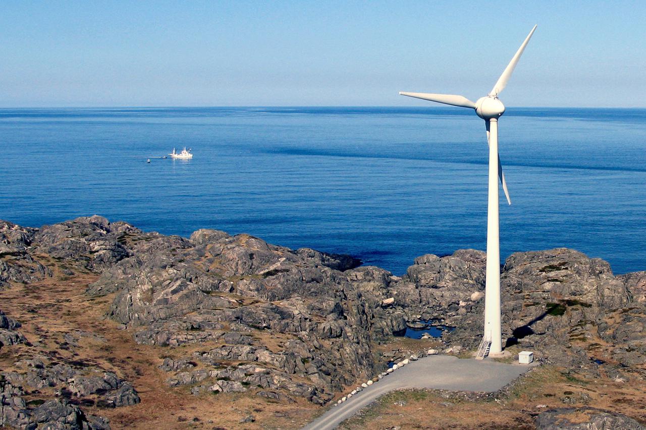 FILE PHOTO: A windmill is seen near the ocean on the North Sea island of Utsira