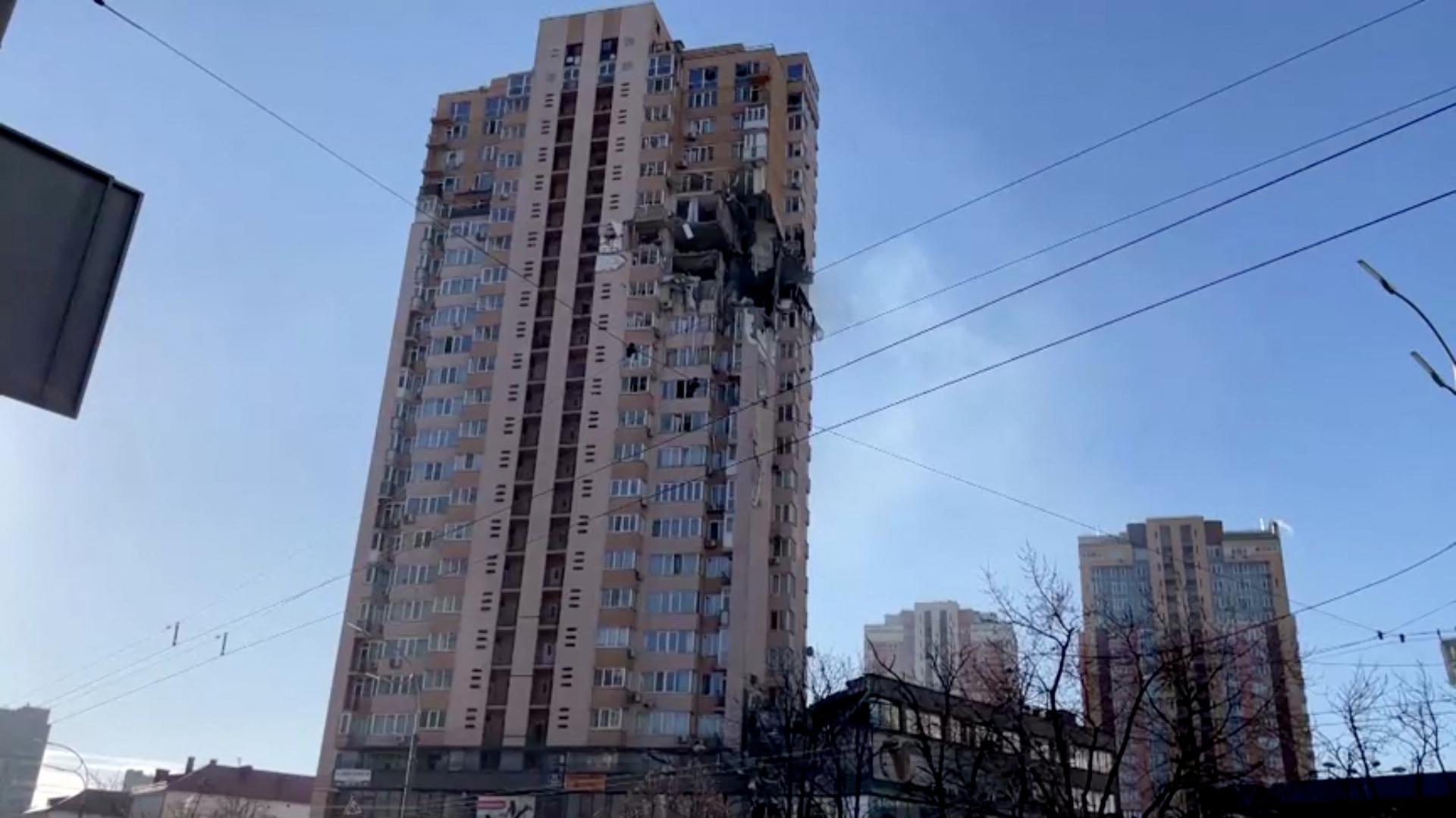 A screengrab from a video shows a damaged multi-storey residential building in an aftermath of shelling, after Russia launched a massive military operation against Ukraine, in south-west of Kyiv, Ukraine February 26, 2022. Reuters TV via REUTERS Photo: REUTERS TV/REUTERS