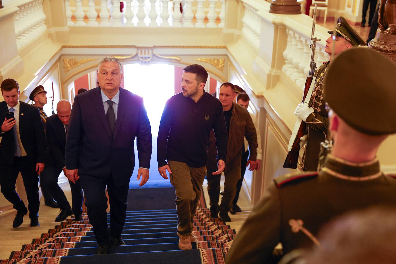Hungary's Prime Minister Viktor Orban and Ukrainian President Volodymyr Zelenskiy arrive for a meeting, amid Russia's attack on Ukraine