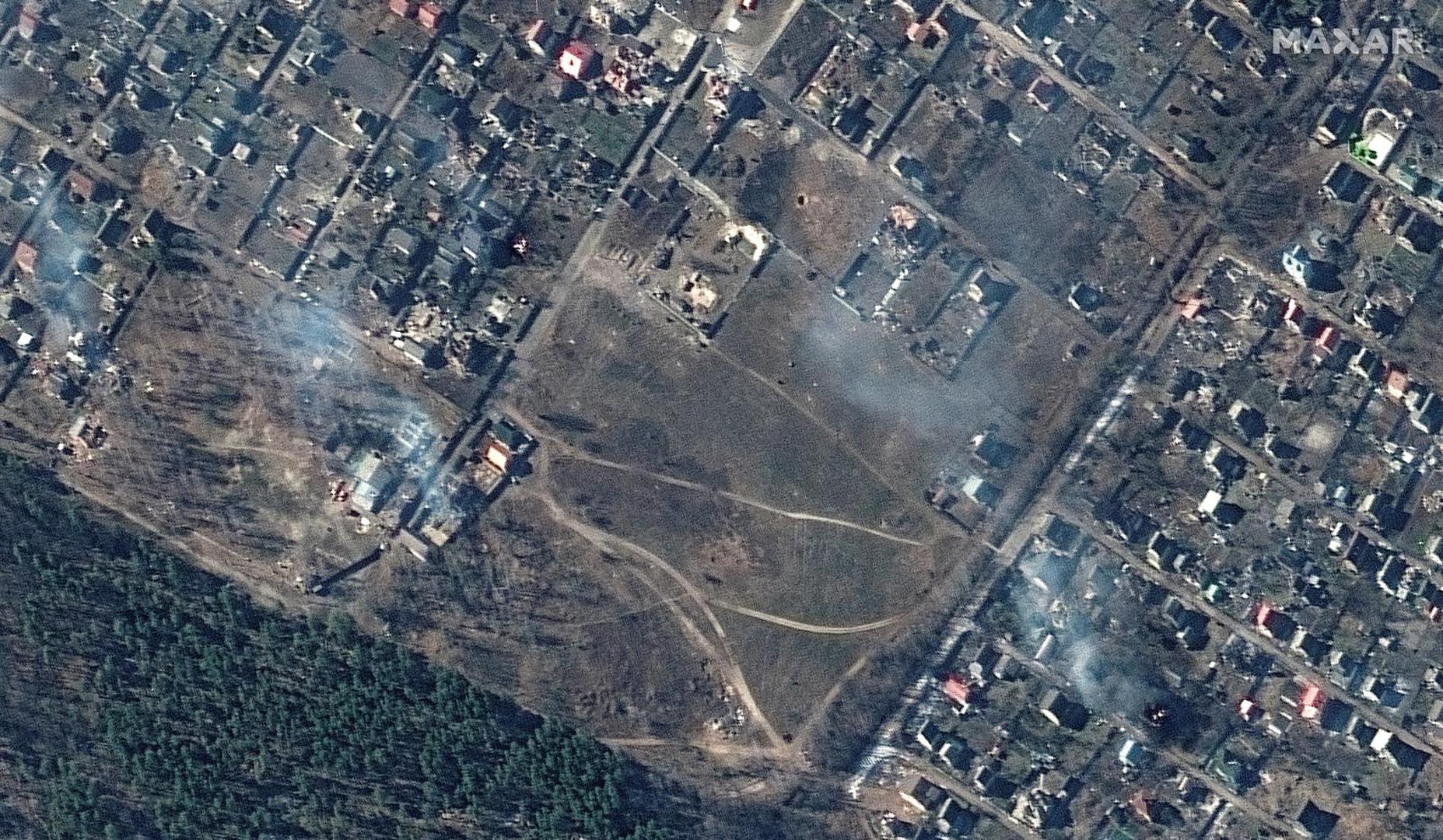 A satellite image shows a natural color closer view of burning homes, in Moschun, Ukraine March 11, 2022. Satellite image ©2022 Maxar Technologies/Handout via REUTERS ATTENTION EDITORS - THIS IMAGE HAS BEEN SUPPLIED BY A THIRD PARTY. MANDATORY CREDIT. NO RESALES. NO ARCHIVES. DO NOT OBSCURE LOGO. Photo: MAXAR TECHNOLOGIES/REUTERS