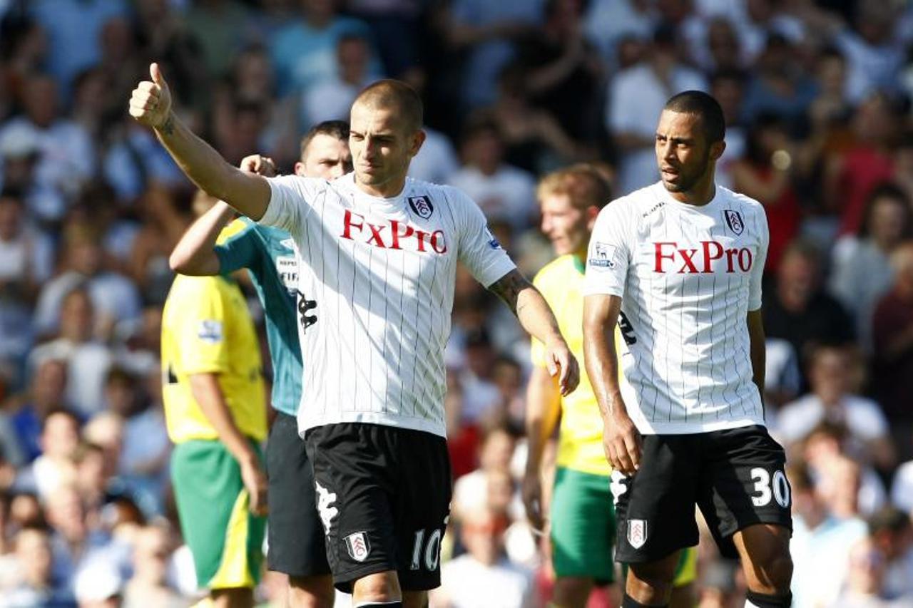 'Fulham\'s Mladen Petric celebrates after scoring his second goal during the Barclays Premier League match at Craven Cottage, London. Photo: Press Association/Pixsell'