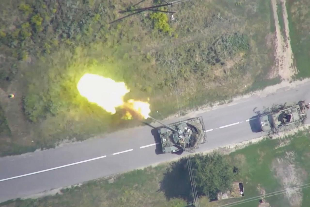 An aerial view shows what is said to be a firing Ukrainian tank in Kursk region