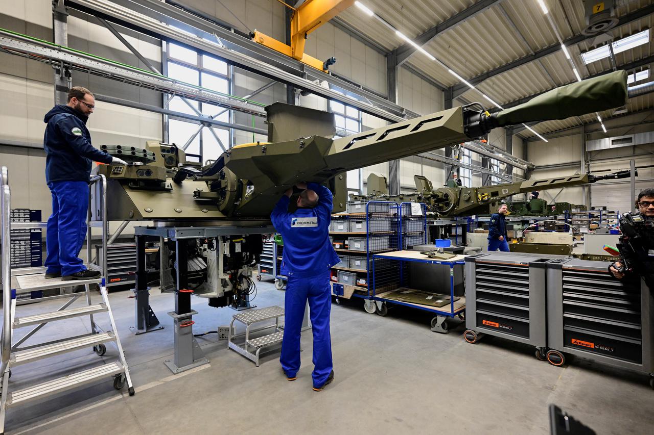 German Chancellor Scholz and Defence Minister Pistorius visit the future site of an arms factory in Unterluess