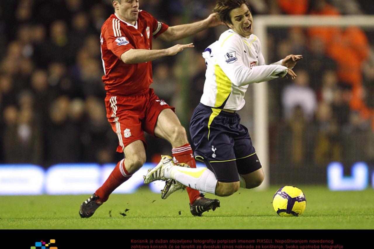 \'Liverpool\'s Jamie Carragher (left) and Tottenham Hotspur\'s Niko Kranjcar battle for the ball Photo: Press Association/Pixsell\'