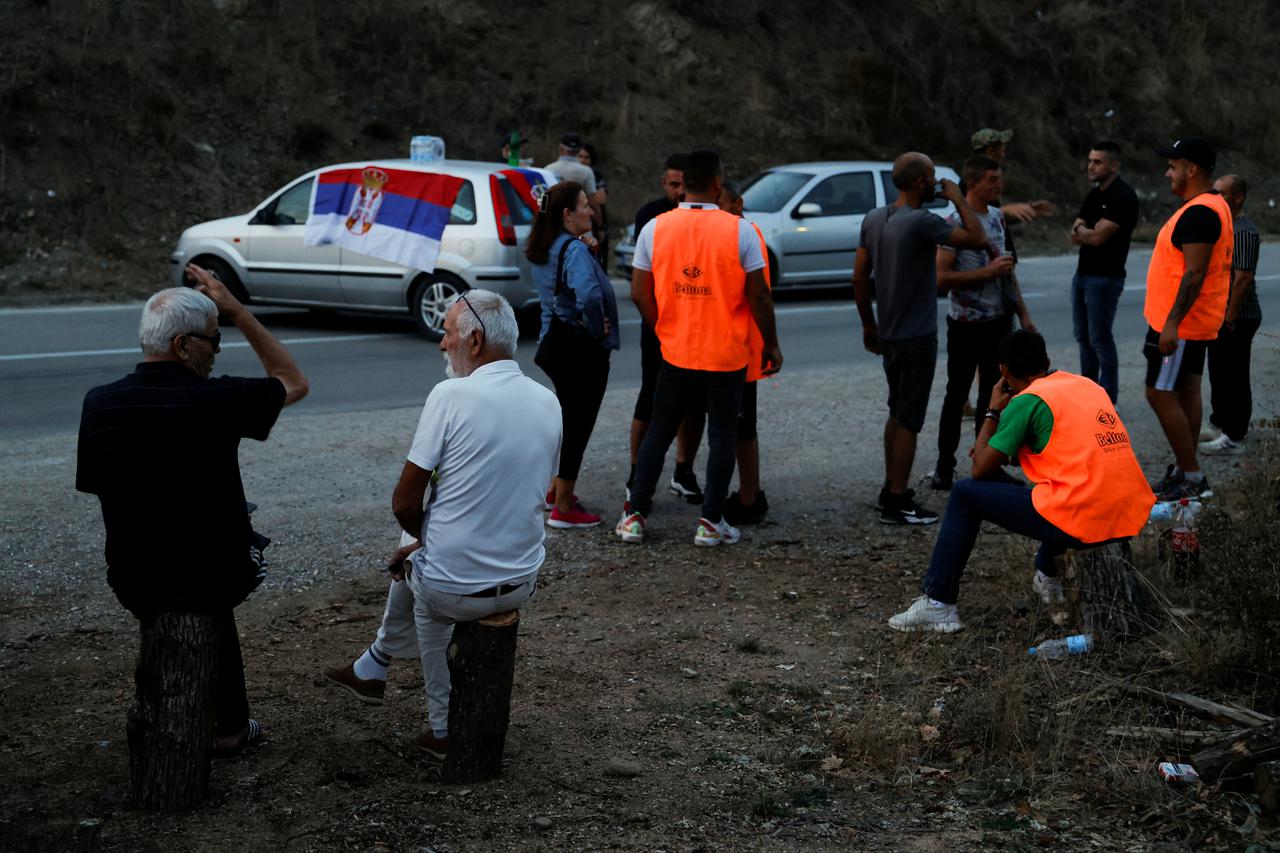 Protestors gather to partially block the road near the main Kosovo-Serbia border crossing in Merdare