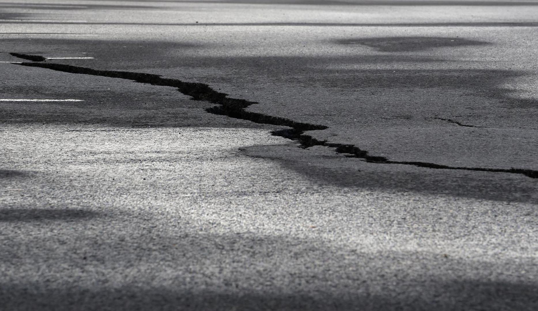 A road is damaged in the village of Grindavik, which was evacuated due to volcanic activity, in Iceland November 14, 2023. REUTERS/Ben Makori Photo: BEN MAKORI/REUTERS