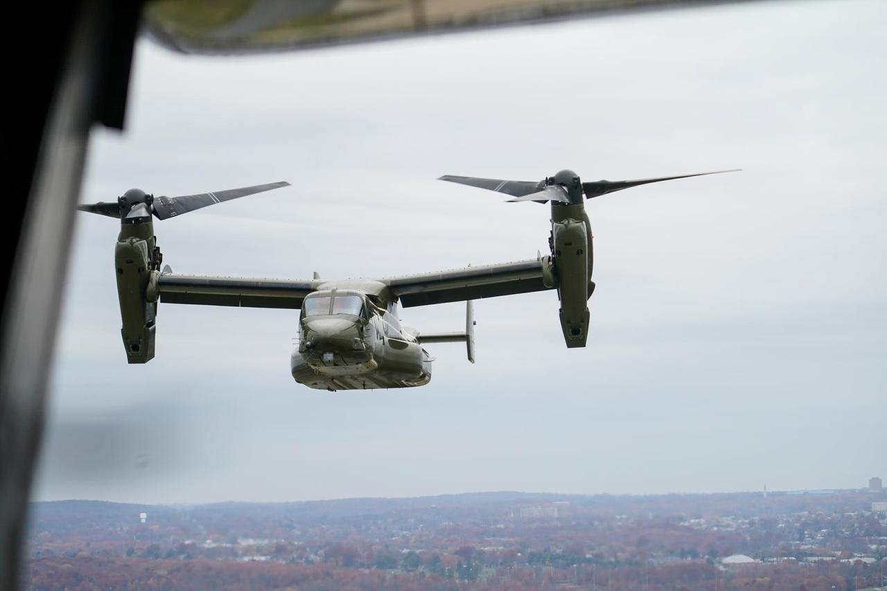 Bell Boeing V-22 Osprey tilt-rotor military aircraft flies over Delaware