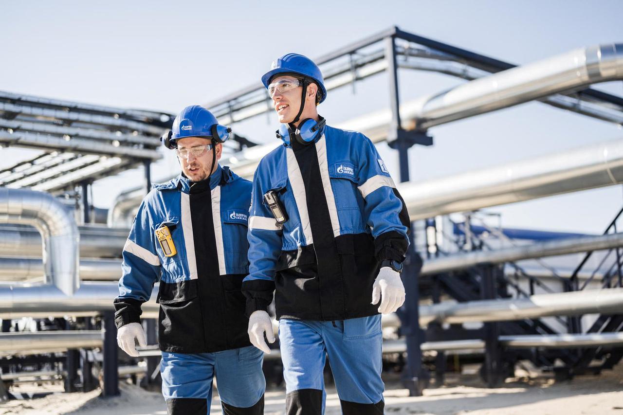 Employees work at the Alexander Zhagrin oilfield operated by Gazprom Neft in Khanty-Mansi Autonomous Area–Yugra