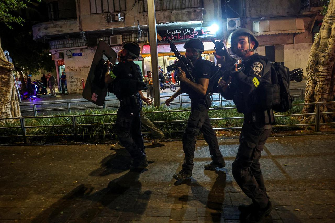 Israeli police patrol following a fatal shooting attack in Jaffa