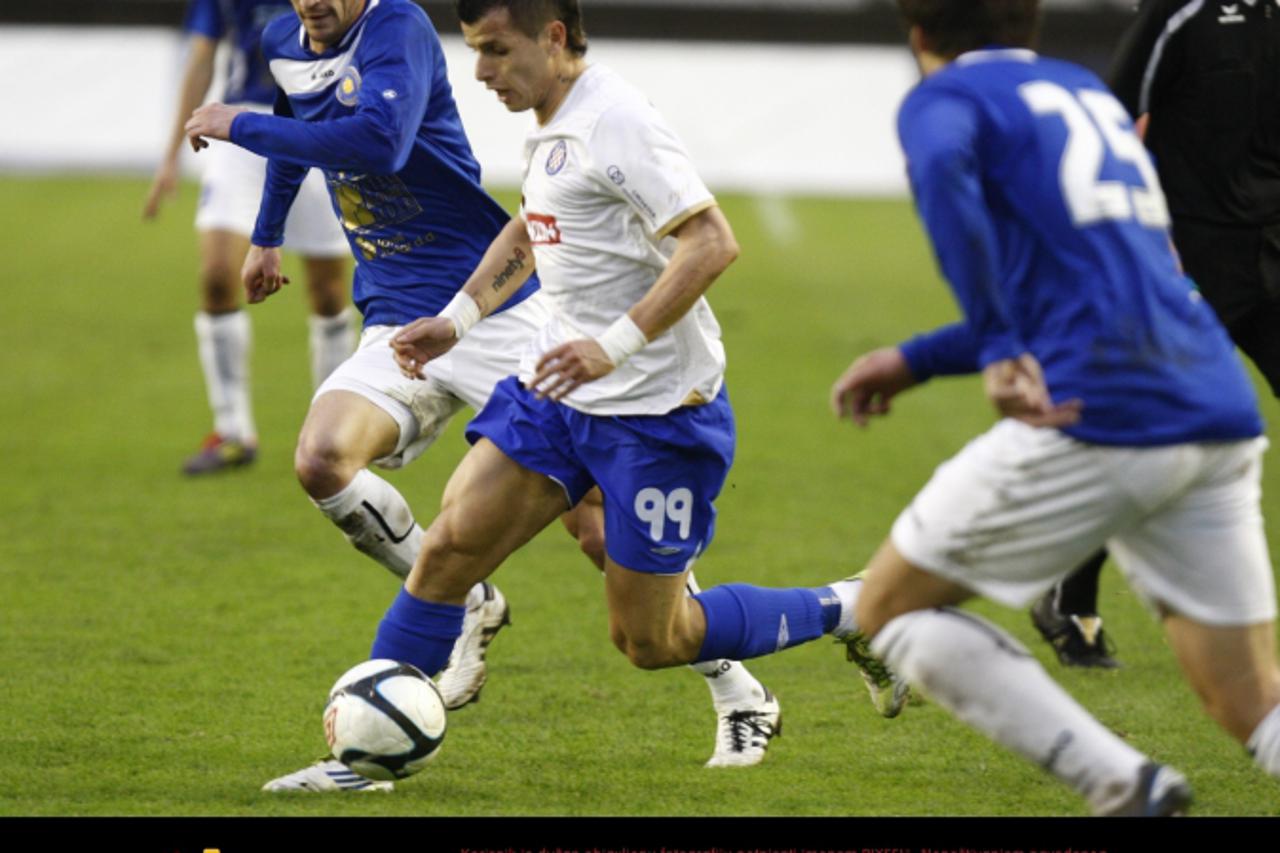 '04.12.2011., Gradski stadion u Poljudu, Split - 1. HNL, 17. kolo, Hajduk Split - NK Zadar.  Anas Sharbini izmedju igraca Zadra.  Photo: Ivo Cagalj/PIXSELL'