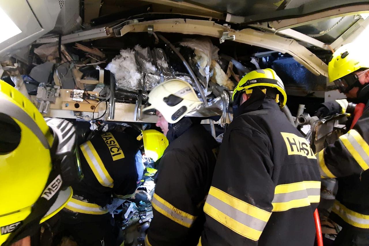 Emergency responders are seen at the site of a train accident in Cesky Brod