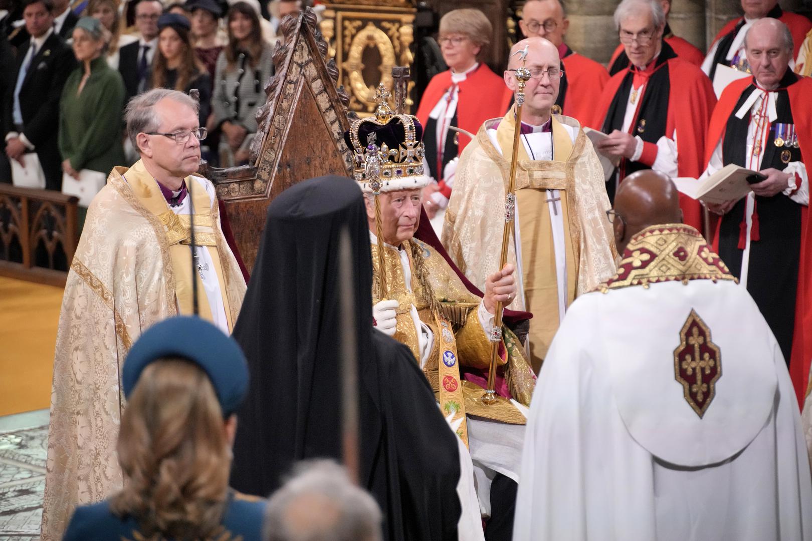 King Charles III is crowned with St Edward's Crown by The Archbishop of Canterbury the Most Reverend Justin Welby during his coronation ceremony in Westminster Abbey, London. Picture date: Saturday May 6, 2023. Photo: Jonathan Brady/PRESS ASSOCIATION