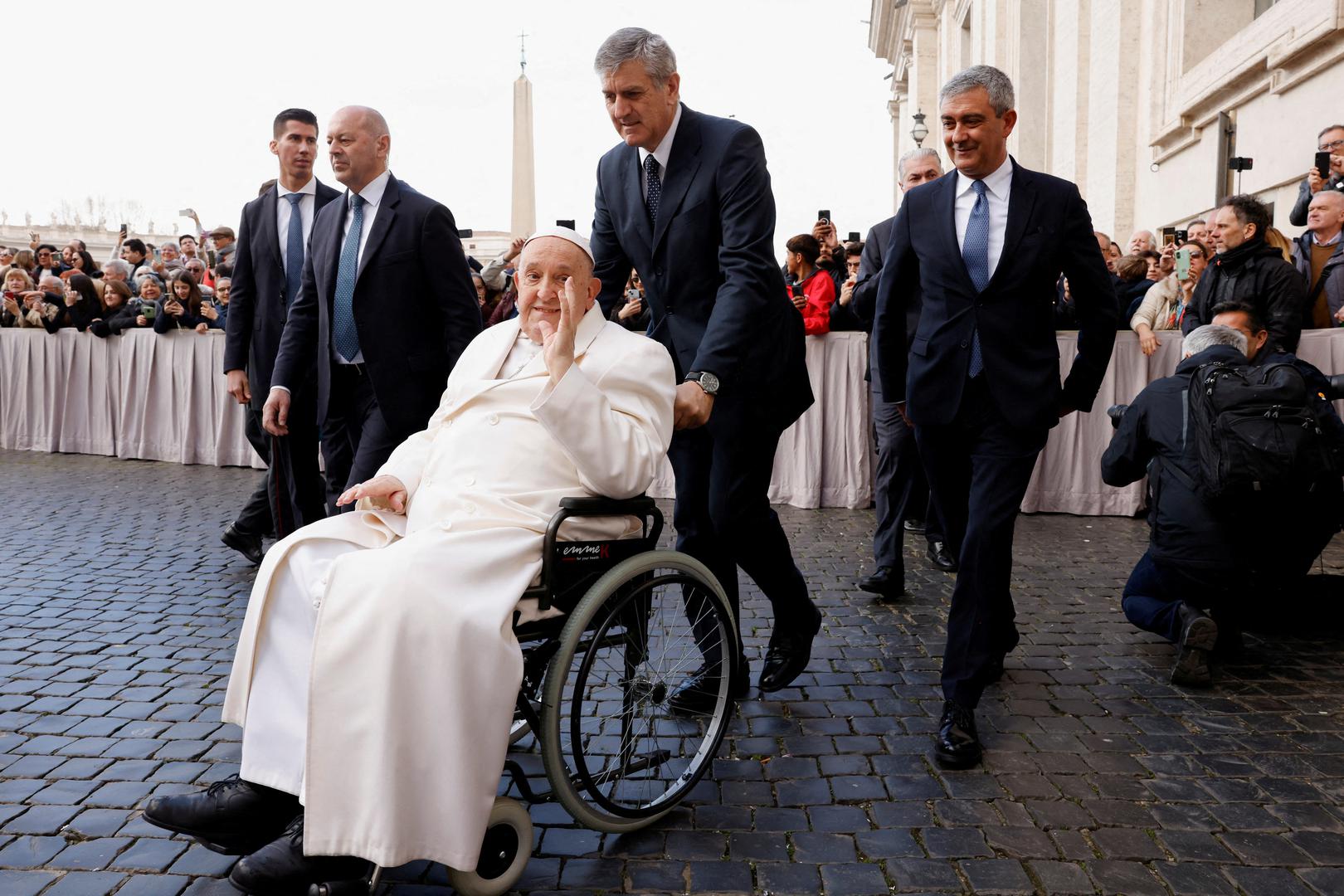 Pope Francis gestures after he failed to climb into his popemobile and was subsequently helped back into his wheelchair to leave Saint Peter Square at the Vatican, March 6, 2024. REUTERS/Remo Casilli Photo: REMO CASILLI/REUTERS