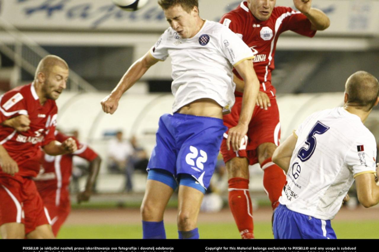 '29.07.2012., Stadion Poljud, Split  - MAXtv 1. HNL, 2. kolo, HNK Hajduk - RNK Split. Mario Maloca i Tomislav Radotic u skoku za loptu. Photo: Ivo Cagalj/PIXSELL'