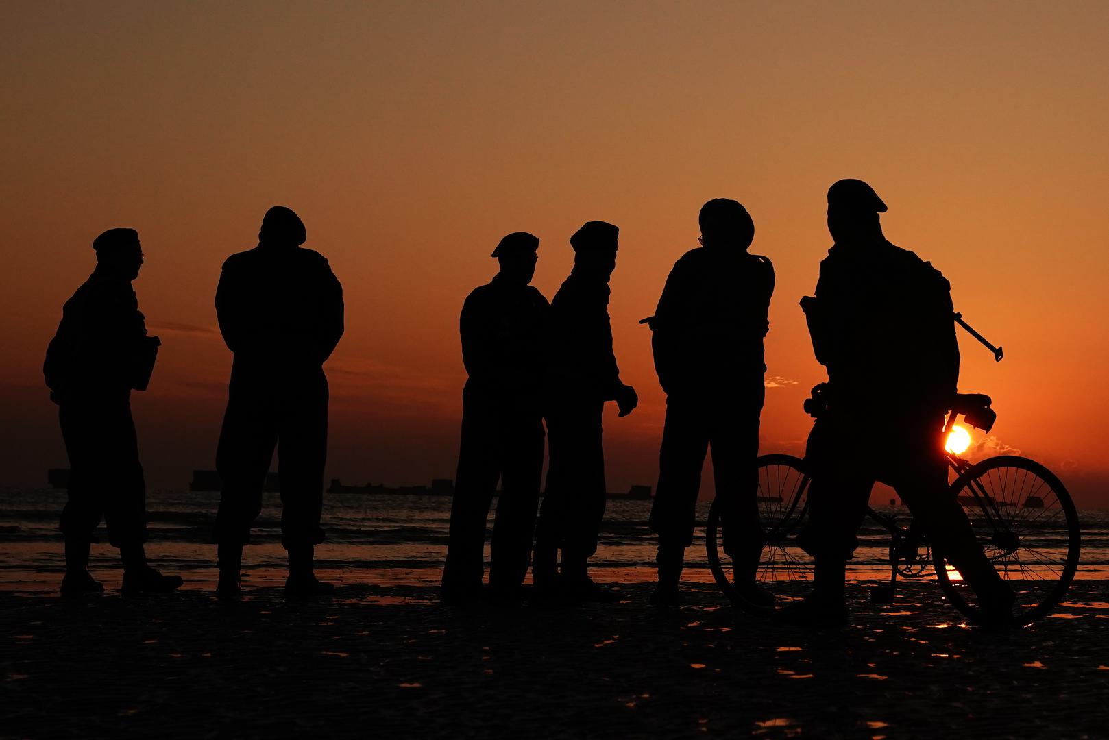 Re-enactors on Gold Beach in Arromanches at sunrise in Normandy, France, to commemorate the 80th anniversary of the D-Day landings. Picture date: Thursday June 6, 2024. Photo: Aaron Chown/PRESS ASSOCIATION