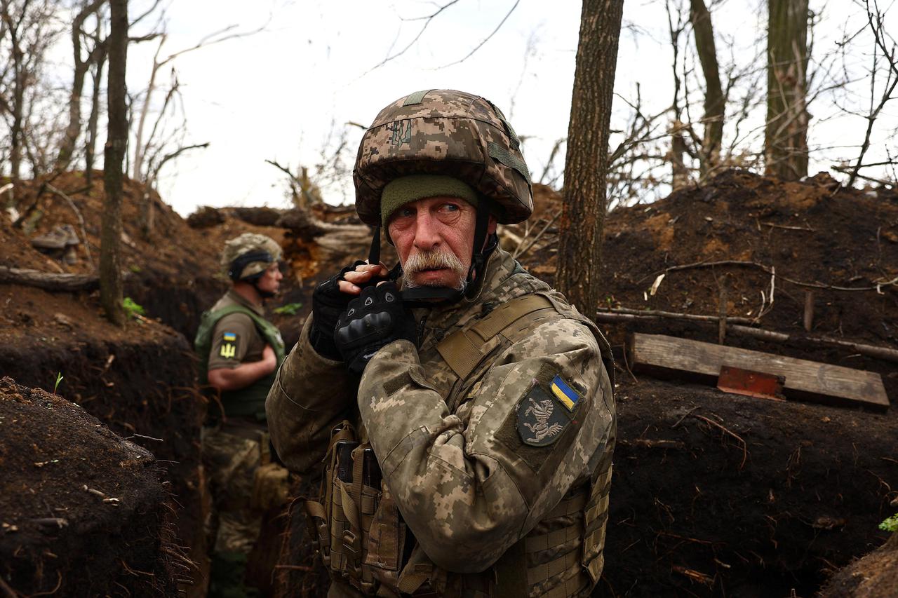 Ukrainian servicemen with the the 1st Tank Brigade  operate at the frontline near Donetsk