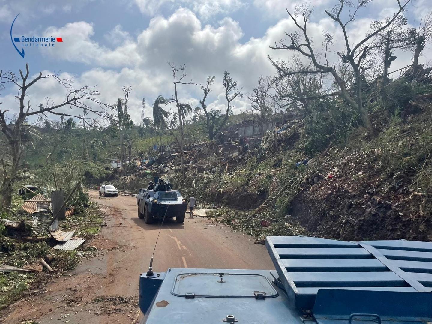 French Gendarmerie forces cross a damaged area in the aftermath of Cyclone Chido, in Mayotte, France December 15, 2024. Gendarmerie Nationale/Handout via REUTERS    THIS IMAGE HAS BEEN SUPPLIED BY A THIRD PARTY. NO RESALES. NO ARCHIVES. WATERMARK FROM SOURCE. Photo: GENDARMERIE NATIONALE/REUTERS