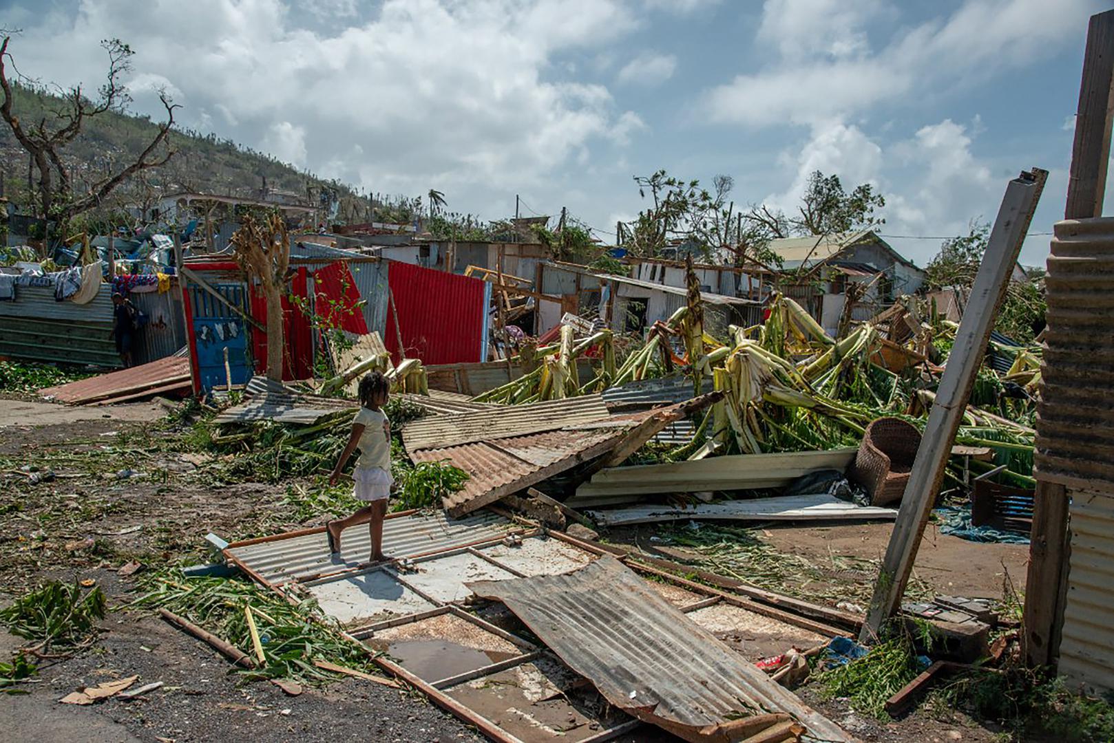 A scene of devastation after the cyclone Chido hit France’s Indian Ocean territory of Mayotte, on December 14, 2024 in the Bandrajou Kaweni district of the capital Mamoudzou. At least several hundred people are feared to have been killed after the worst cyclone in almost a century ripped through the French Indian Ocean territory of Mayotte on Saturday, uprooting trees, tearing houses apart and pounding the impoverished archipelago’s already weak infrastructure. Rescuers have been dispatched to the islands, which lie between the coast of Mozambique and Madagascar, but their efforts are likely to be hindered by damage to airports and electricity distribution in an area where clean drinking water is subject to chronic shortages. Photo by David Lemor/ABACAPRESS.COM Photo: Lemor David/ABACA/ABACA