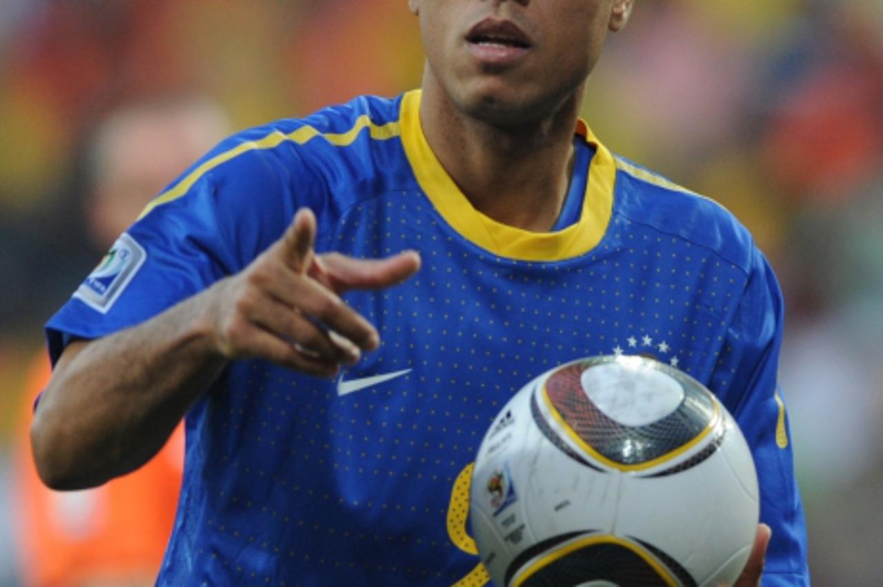 'Brazil\'s striker Luis Fabiano runs during the 2010 World Cup quarter final Netherlands vs Brazil on July 2, 2010 at Nelson Mandela Bay stadium in Port Elizabeth. NO PUSH TO MOBILE / MOBILE USE SOLEL