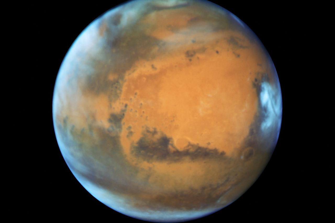 FILE PHOTO: The planet Mars taken by the NASA Hubble Space Telescope when the planet was 50 million miles from Earth