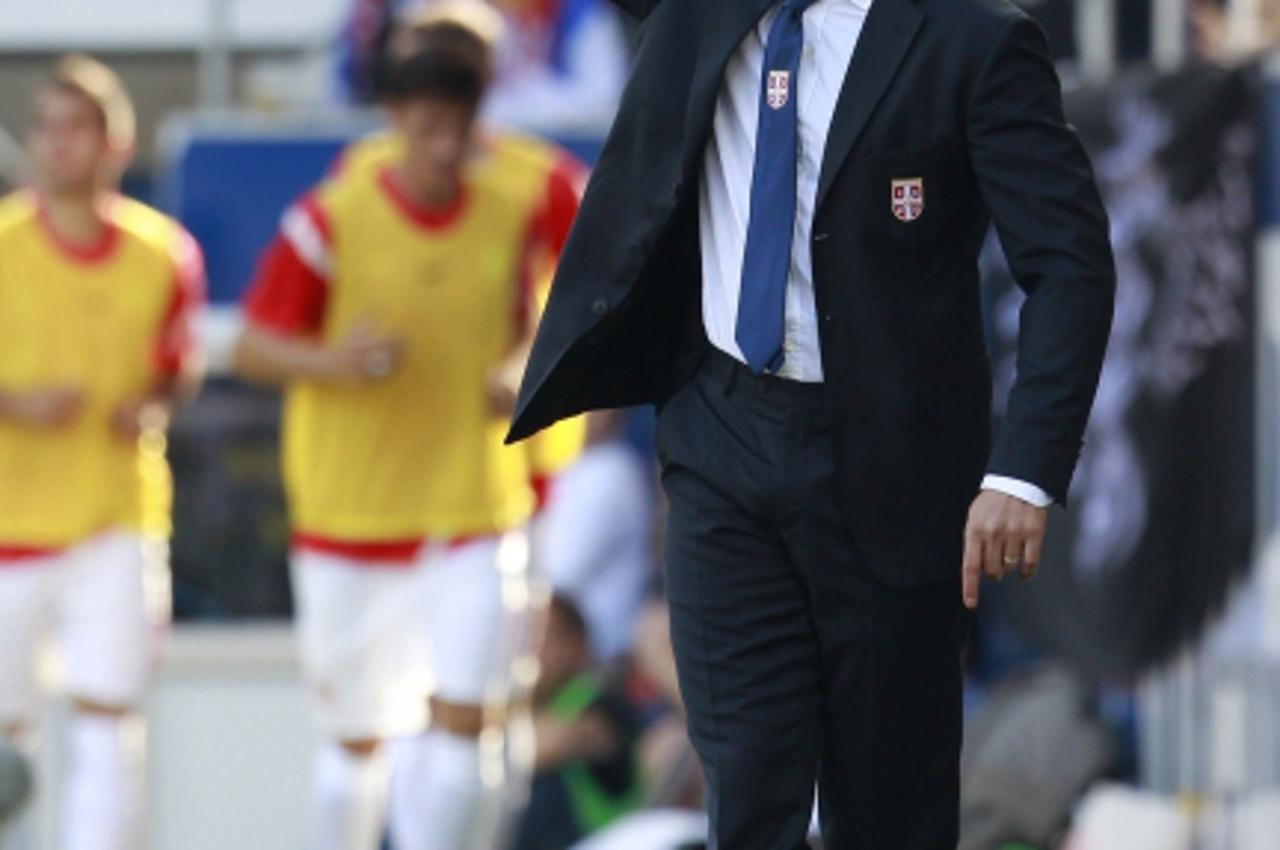 'Serbia\'s national soccer team head coach Sinisa Mihajlovic reacts during their friendly soccer match in St. Gallen May 26, 2012.  REUTERS/Miro Kuzmanovic (SWITZERLAND - Tags: SPORT SOCCER)'