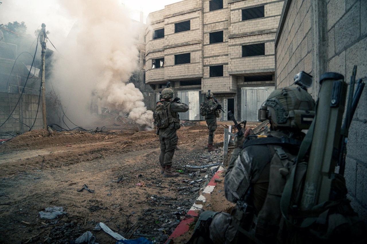 Israeli soldiers operate in the Gaza Strip amid the ongoing conflict between Israel and the Palestinian Islamist group Hamas