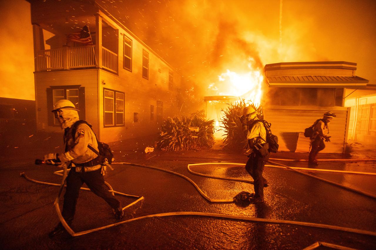 Palisades Fire burns during a windstorm on the west side of Los Angeles