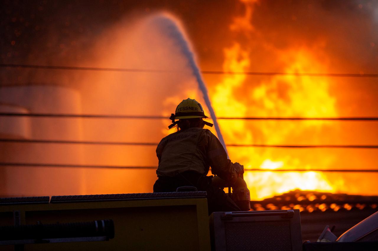 Palisades fire burns during a windstorm on the west side of Los Angeles