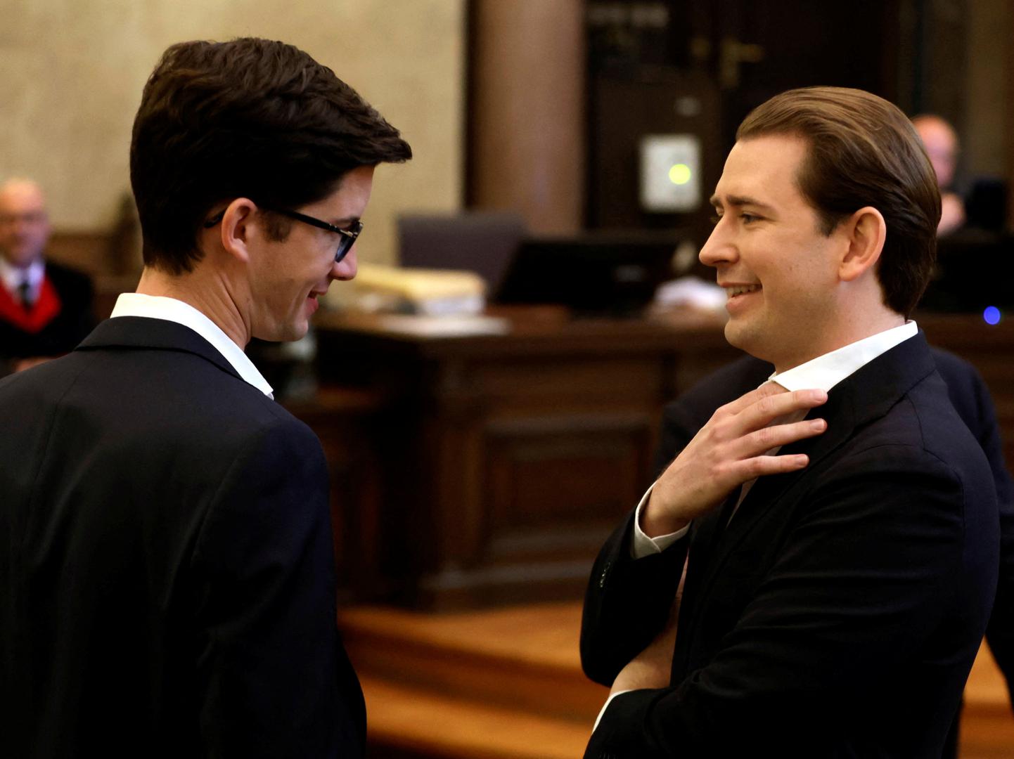 Austria's conservative former Chancellor Sebastian Kurz and Bernhard Bonelli wait for the start of their trial for perjury in a courtroom in Vienna, Austria, October 18, 2023. REUTERS/Leonhard Foeger Photo: LEONHARD FOEGER/REUTERS