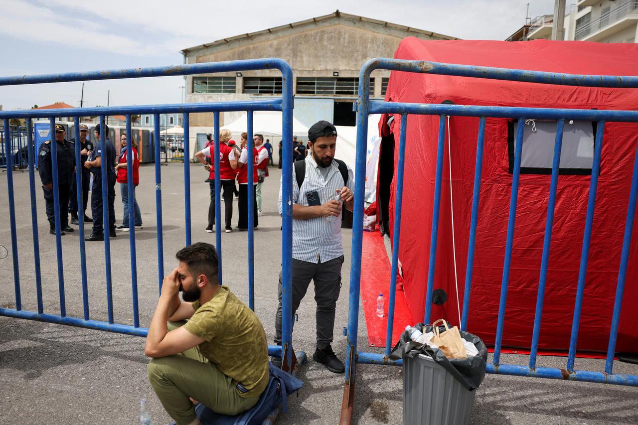 Rescued migrants at the port of Kalamata following a rescue operation