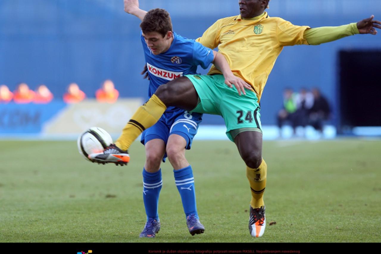 '07.03.2012., Zagreb,stadion Maksimir - Prva cetvrt-finalna utakmica hrvatskog nogometnog kupa izmedju GNK Dinama i NK Istre 1961.Mateo Kovacic i Belle Henri. Photo: Igor Kralj/PIXSELL'