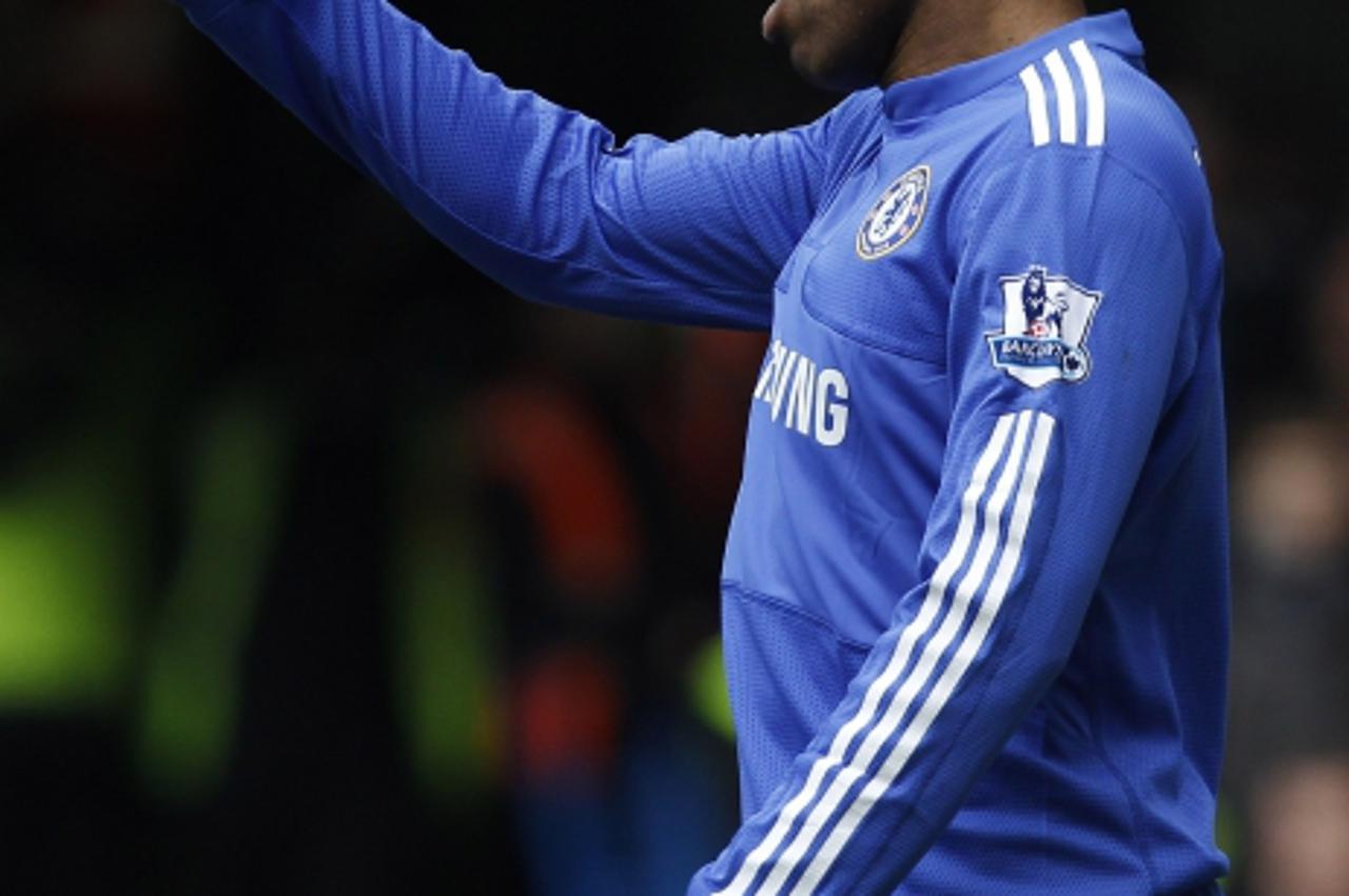 'Chelsea\'s Didier Drogba gestures during their English Premier League soccer match against West Ham United at Stamford Bridge in London March 13, 2010.   REUTERS/Stefan Wermuth (BRITAIN - Tags: SPORT