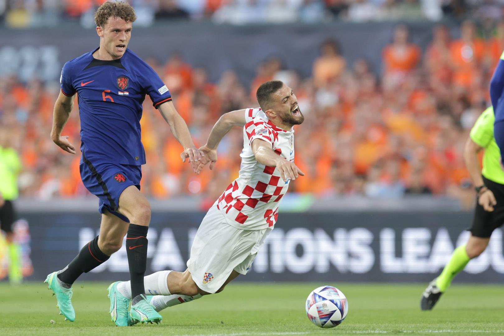 14.06.2023., stadion Feyenoord "De Kuip", Rotterdam, Nizozemska - UEFA Liga Nacija, polufinale, Nizozemska - Hrvatska. Mats Wieffer, Mateo Kovacic Photo: Luka Stanzl/PIXSELL