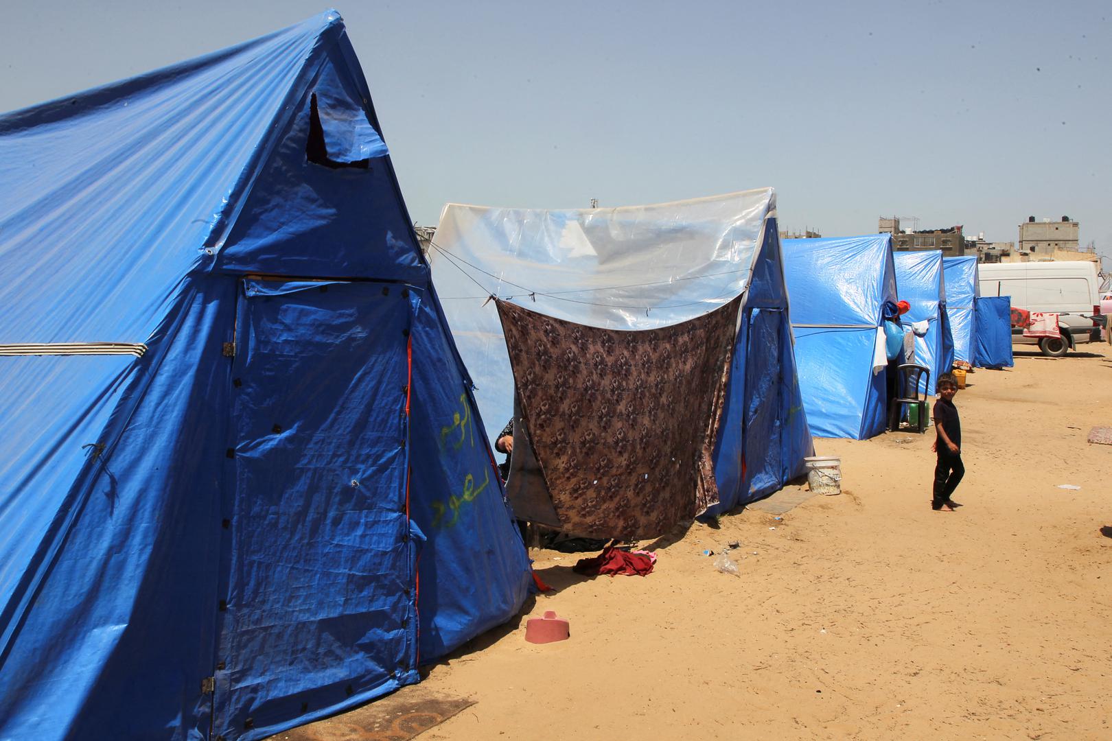 A child looks on, as displaced Palestinians, who fled their houses due to Israeli strikes, shelter at a tent camp, amid the ongoing conflict between Israel and the Palestinian Islamist group Hamas, in Rafah in the southern Gaza Strip, May 5, 2024. REUTERS/Hatem Khaled Photo: HATEM KHALED/REUTERS