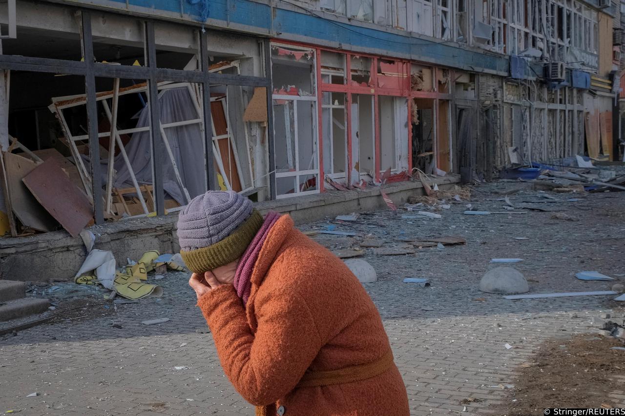 A local resident walks an empty street in Bakhmut