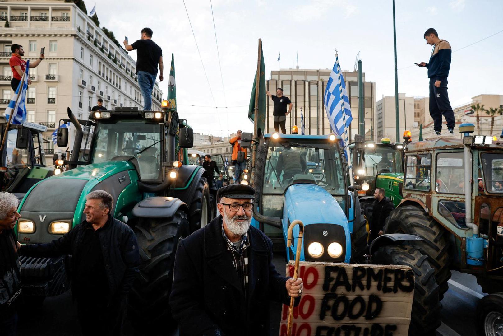 Greek farmers, with their tractors, protest near the Greek parliament over rising energy costs and competition from imports in Athens, Greece, February 20, 2024. REUTERS/Louisa Gouliamaki       TPX IMAGES OF THE DAY Photo: LOUISA GOULIAMAKI/REUTERS