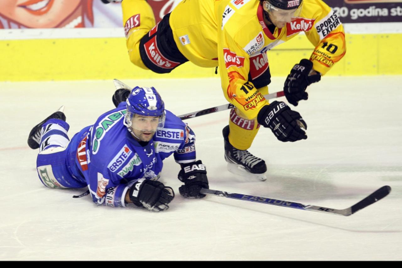 \'26.12.2010.,Ledena dvorana Doma sportova,Zagreb - EBEL liga, KHL Medvescak - EV Vienna Capitals. Miroslav Brumercik, Philipp Pinter Photo: Zeljko Hladika/PIXSELL\'