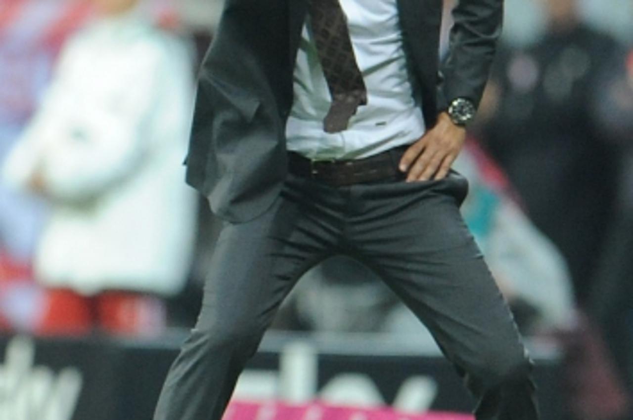 'Munich\'s head coach Pep Guardiola is pictured during the Bundesliga soccer match between FC Bayern Munich and Borussia Moenchengladbach at Allianz Arena in Munich, Germany, 09 August 2013. Photo: An