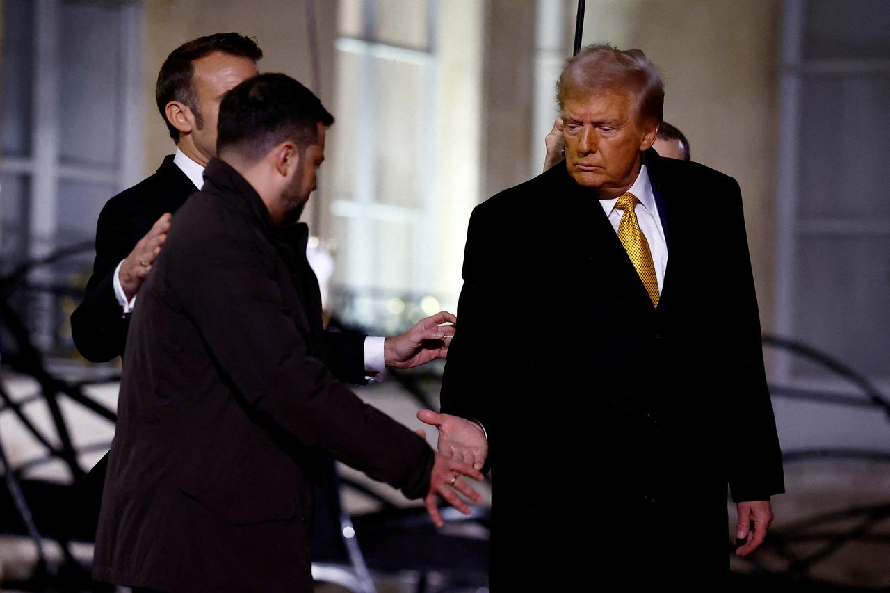 FILE PHOTO: French President Macron meets U.S. President-elect Trump and Ukraine's President Zelenskiy in Paris