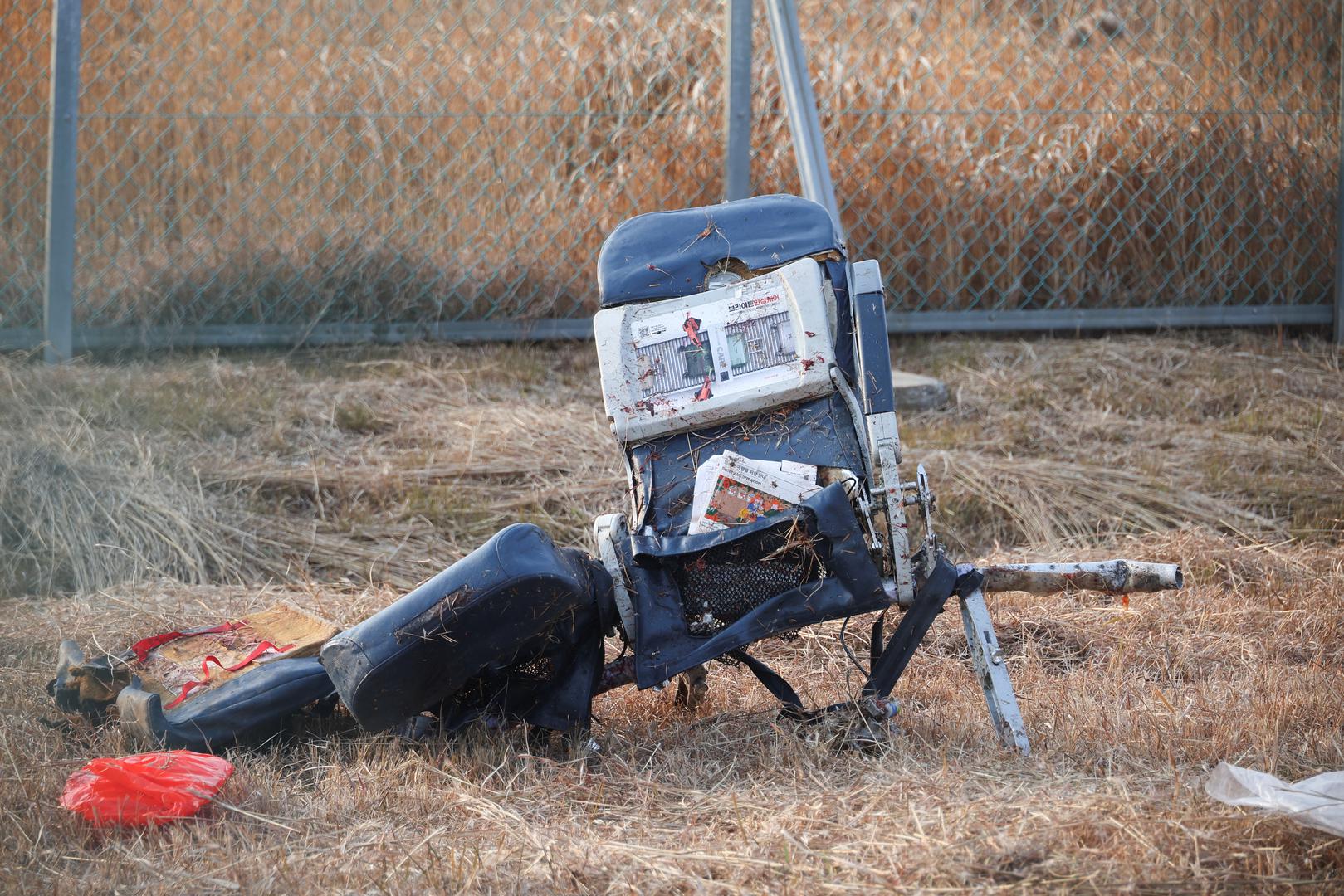 The wreckage of an aircraft lies on the ground after it went off the runway and crashed at Muan International Airport, in Muan, South Korea, December 29, 2024. REUTERS/Kim Hong-Ji Photo: KIM HONG-JI/REUTERS