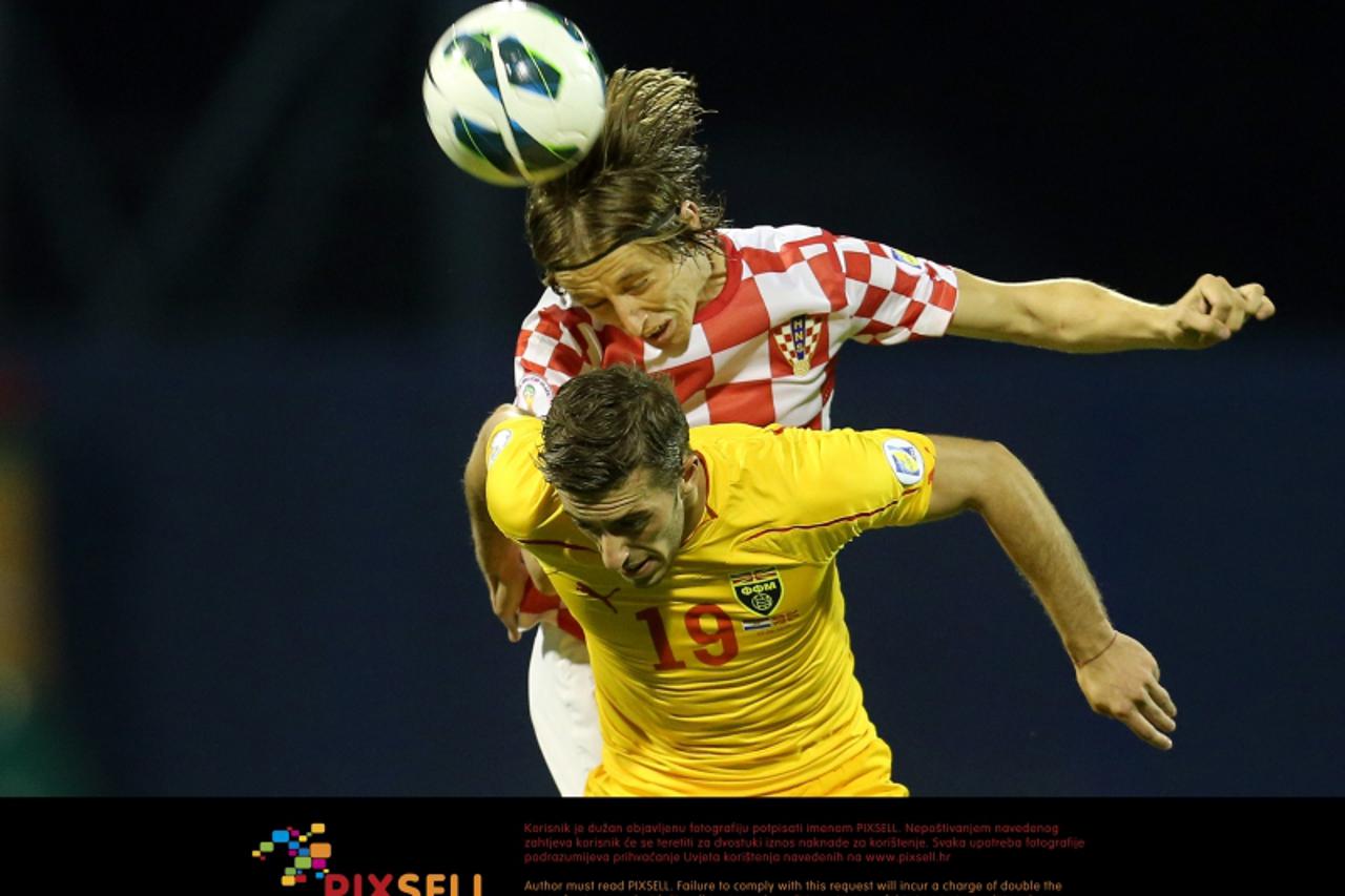 '07.09.2012., stadion u Maksimiru, Zagreb - Kvalifikacije za Svjetsko nogometno prvenstvo 2014., skupina A, Hrvatska - Makedonija. Luka Modric, Agim Ibraimi.  Photo: Igor Kralj/PIXSELL'