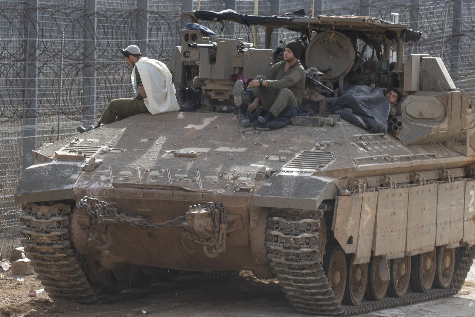 An Israeli soldier performs hi morning prayers atop an Armoured Personnel Carrier (AC) along the border with Syria inside northern Israel in the Israeli-controlled Golan Heights on December 10, 2024. Israel is extending is presence on the ground inside Syria following the Syrian rebel takeover of most of the country in the past days. Photo by Jim Hollander/UPI Photo via Newscom Photo: JIM HOLLANDER/NEWSCOM